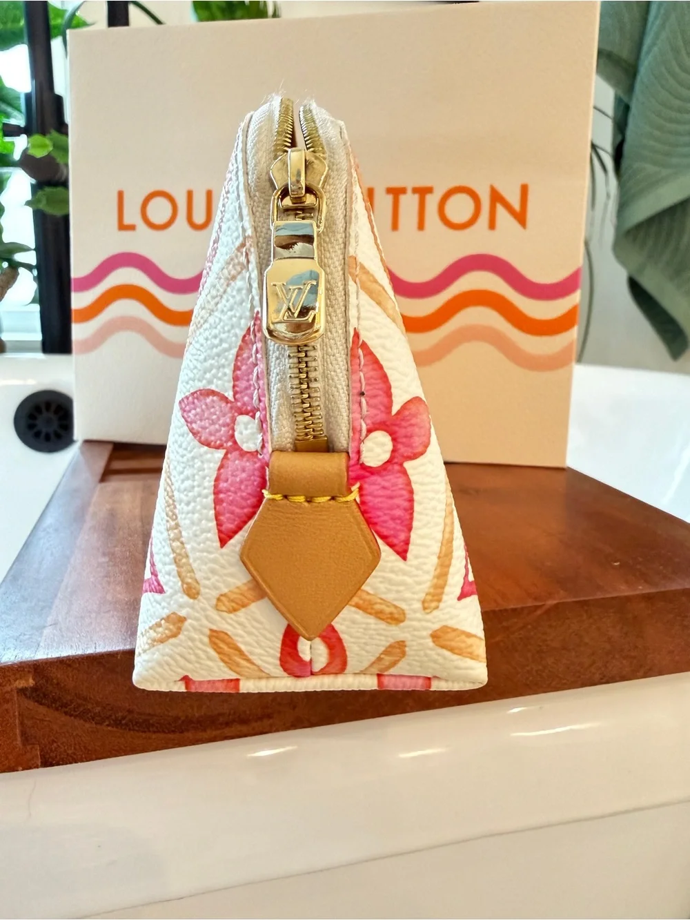 Louis Vuitton Cream Cosmetic Pouch with Pink & Orange Monogram.
